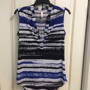 Royal blue, black and white striped blouse.